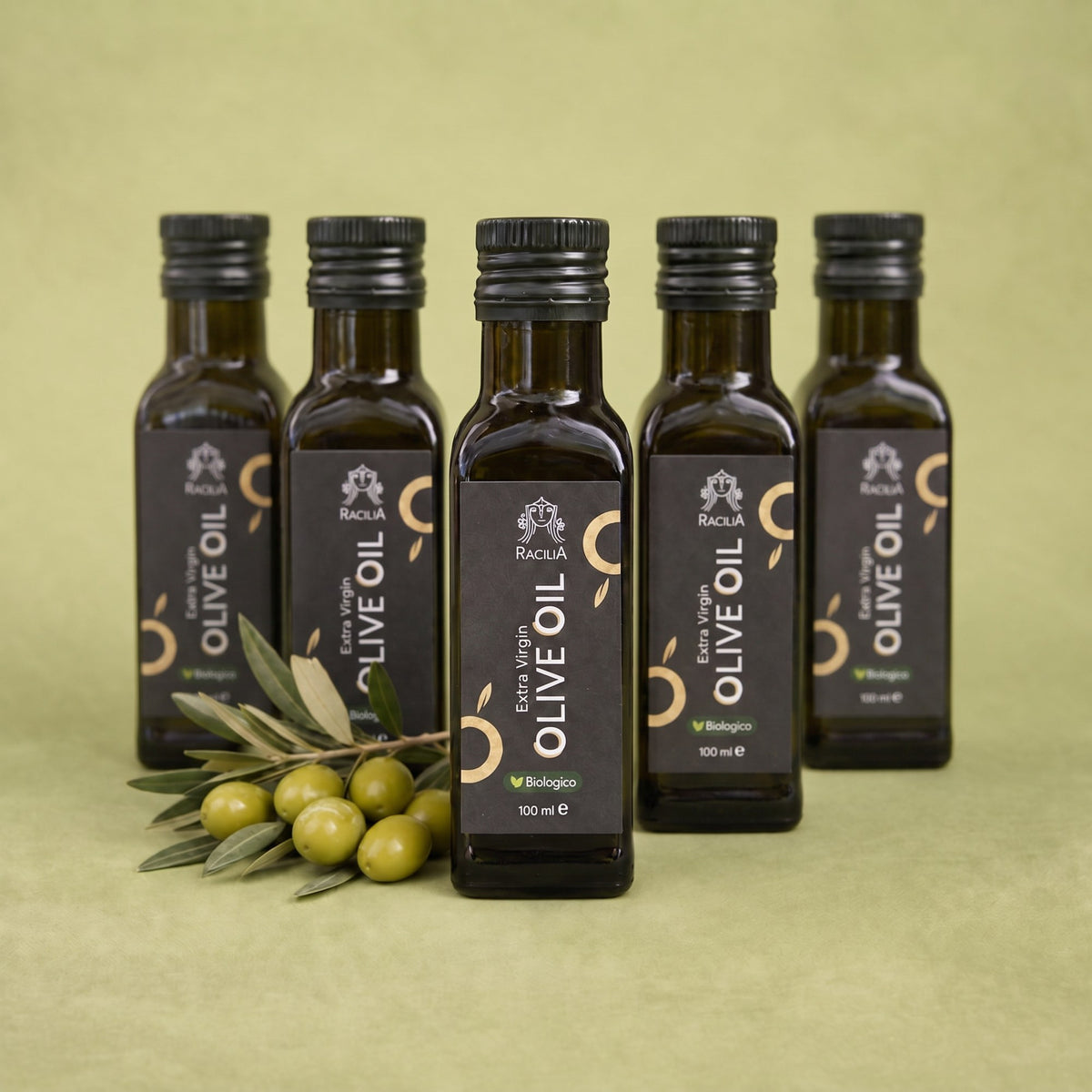 Huile d'olive extra vierge bio Racilia 100 ml, bouteilles en verre foncé avec branche d'olivier et olives vertes