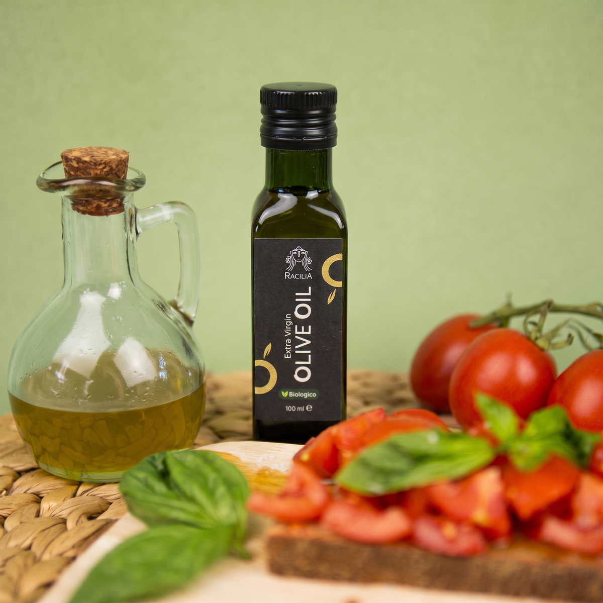 Olio EVO Biologico Racilia 100 ml con ampolla d'olio, pomodori e basilico