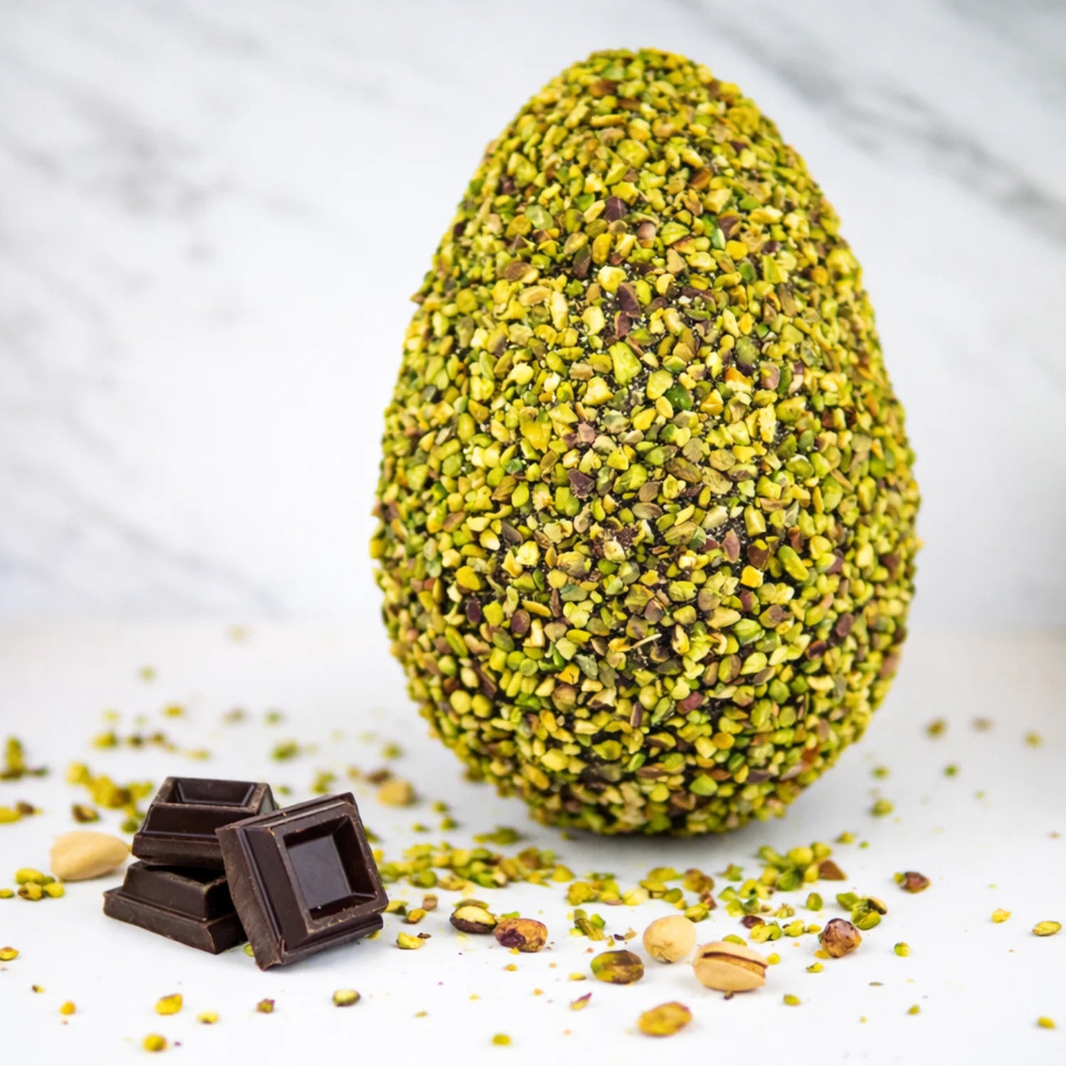 uovo al cioccolato fondente pralinato di pistacchi interi