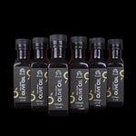 Coffret de 6 bouteilles d'huile d'olive vierge extra bio Racilia 100 ml sur fond noir
